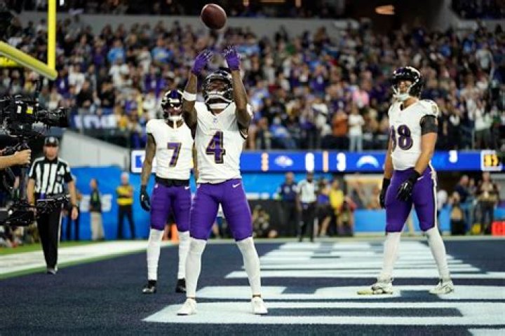 Flowers celebrates his TD catch with wide receiver Rashod Bateman in the second quarter